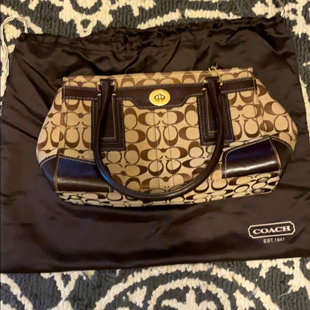 Never used medium coach bag comes with dust bag